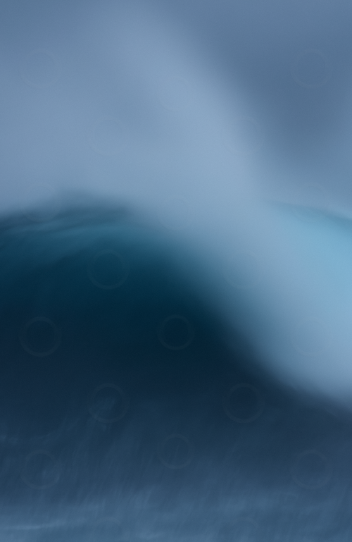 Photograph of a blue wave.